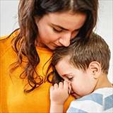 woman holding a young child