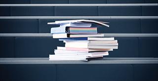 pile of softcover books