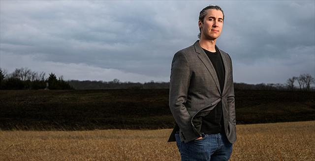 full shot Brett Gelino standing outside