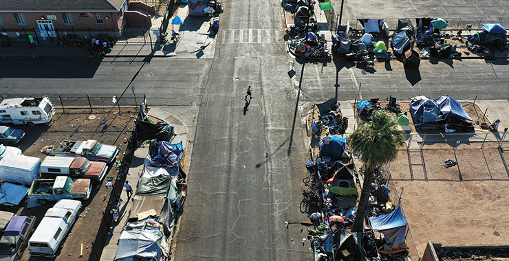 homeless tents set up along a street