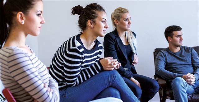 group of adults talking