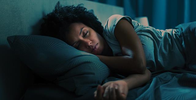 woman in bed asleep