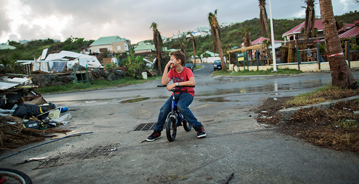 boy sitting on a bike