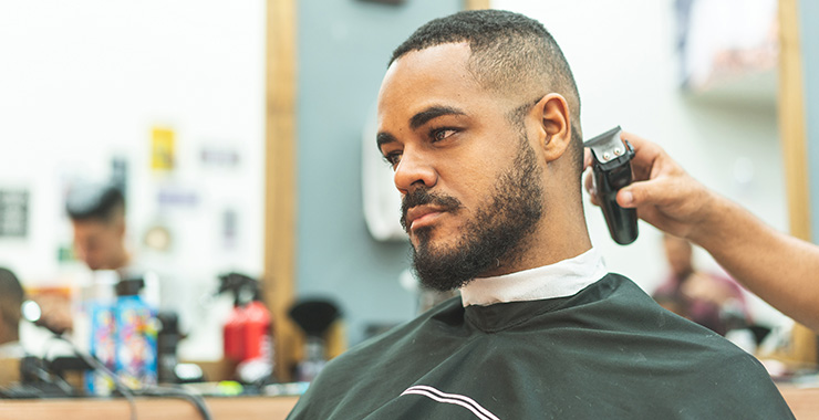 man in a barber's chair