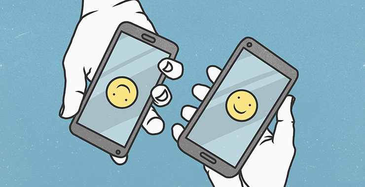 graphic of two smartphones with smiling emojis on the screens