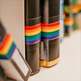 books with rainbow stripes on the spine