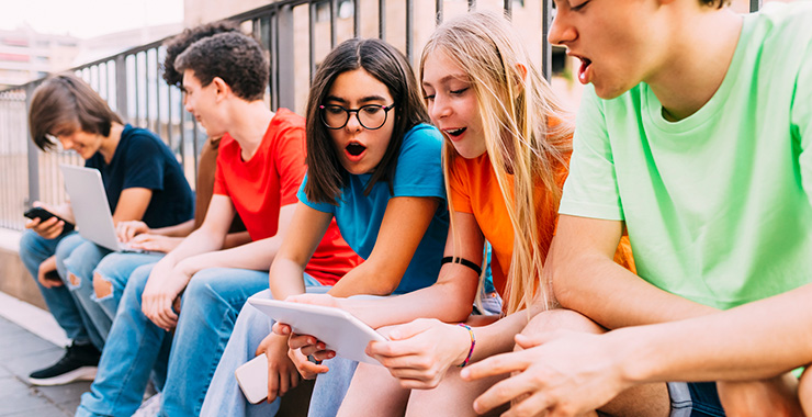 kids looking at a smart screens