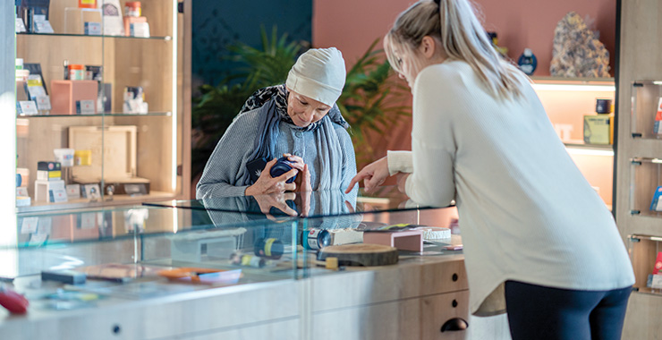 woman at a marijuana dispensary counter