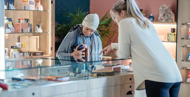 woman at a marijuana dispensary counter