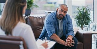 man talking with a female professional
