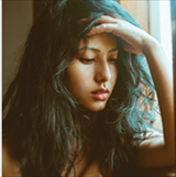 young woman looking worried