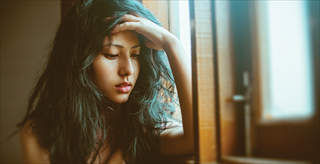 young woman looking worried