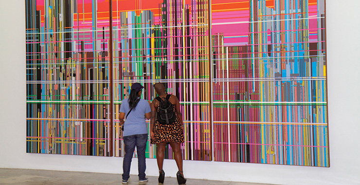 people looking at art