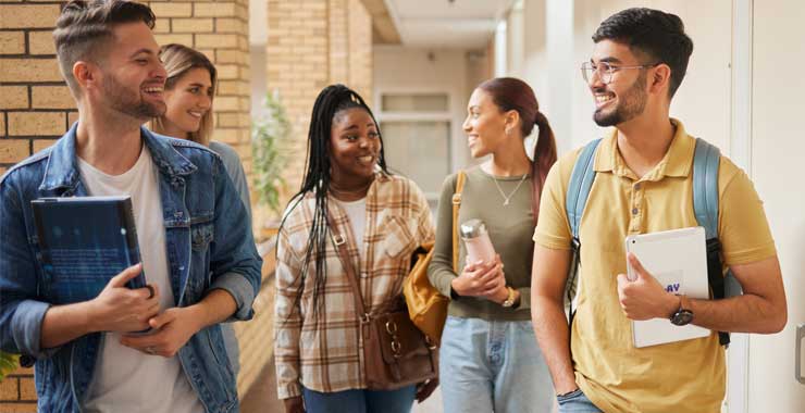 young adult students walking together