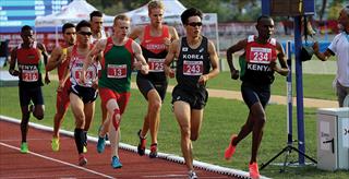 runners competing on an outdoor track