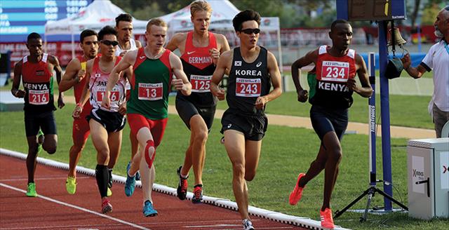 runners competing on an outdoor track