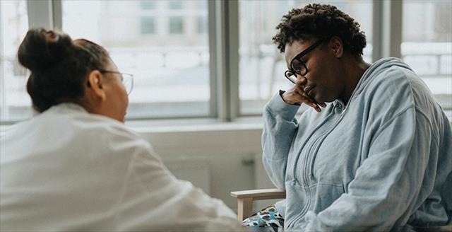 woman with mental health professional