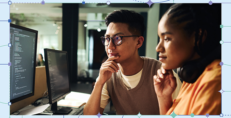 two people looking at a computer screen