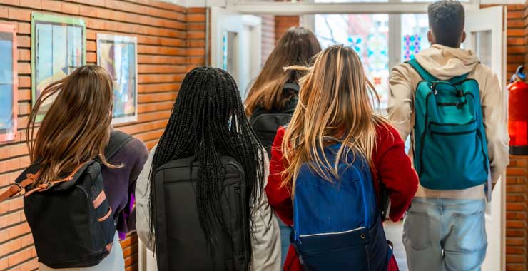 students wearing backpacks