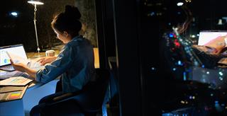 woman up late working