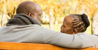 older couple on park bench