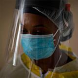 essential worker wearing protective gear