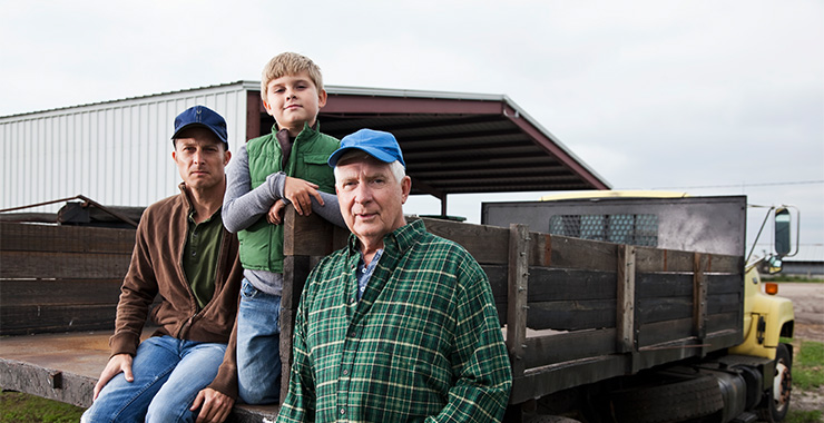 Family of farmers: Grandfather, father and son