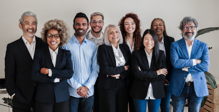 A group of people smiling at camera