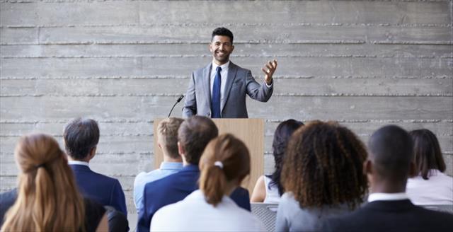 Speaker addressing conference participants
