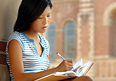 Student taking notes