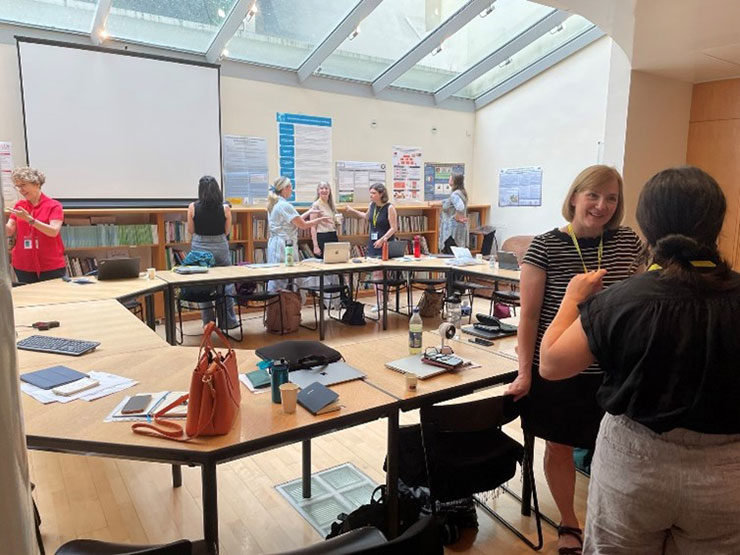 Participants networking during BISTOPS 2024.