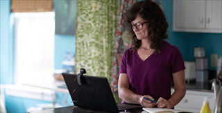 Woman looking at computer screen