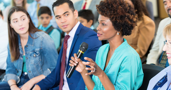 Constituent asking a question at an event