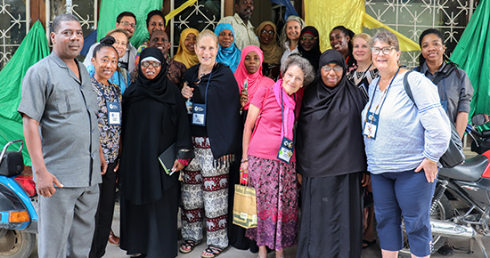 APA delegates with professionals from the department of women and children.