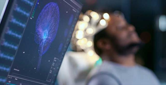 man wearing brainwave scanning headset