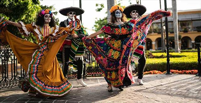 people dancing at Day of the Dead festival