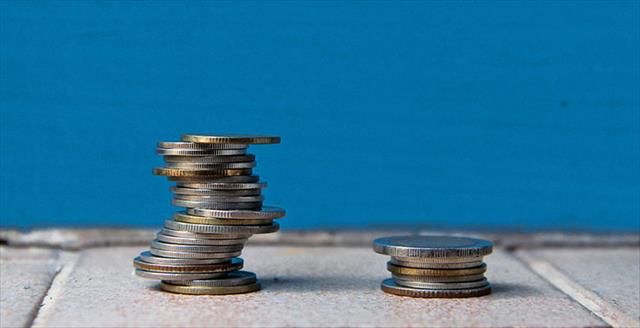 unequal stack of coins
