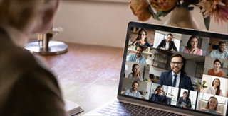 woman on a video conference call with many people