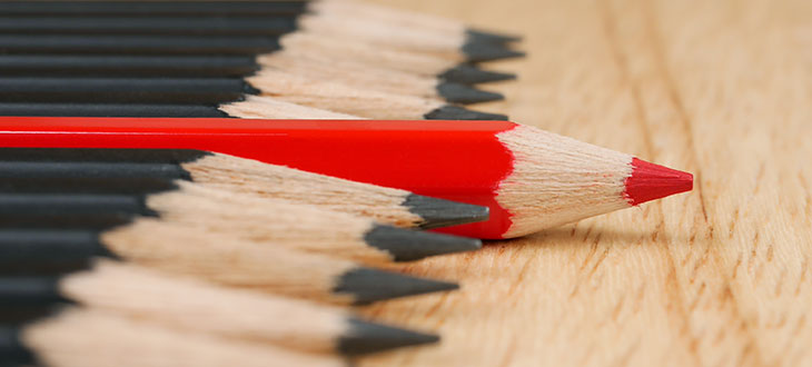 harris cooper homework photo of red pencil standing out among black pencils