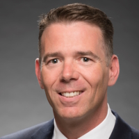 headshot of Eric Kuhn