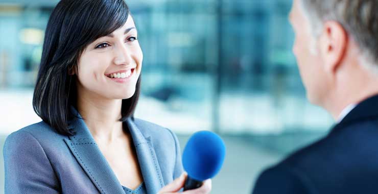 woman interviewing man