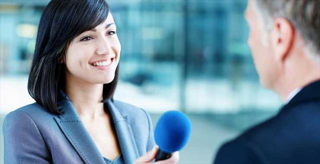 woman interviewing man