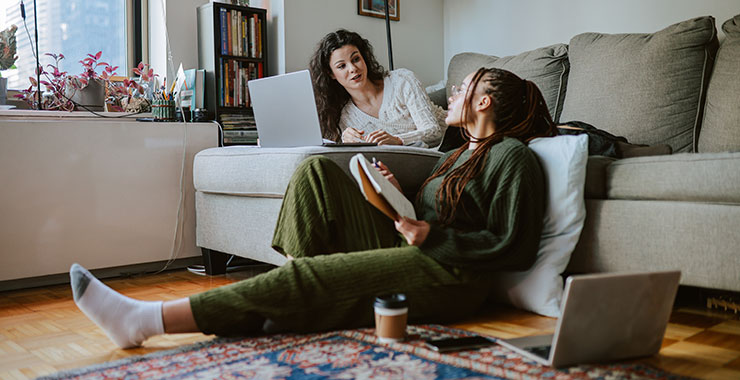 college roommates studying in apartment