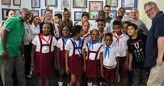 APA delegates visiting a children’s center.