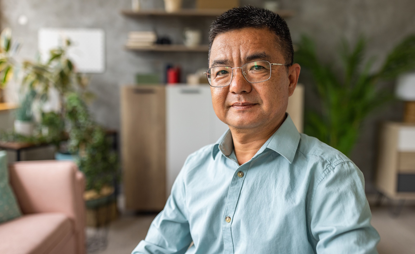 Portrait of a mature Chinese man at home