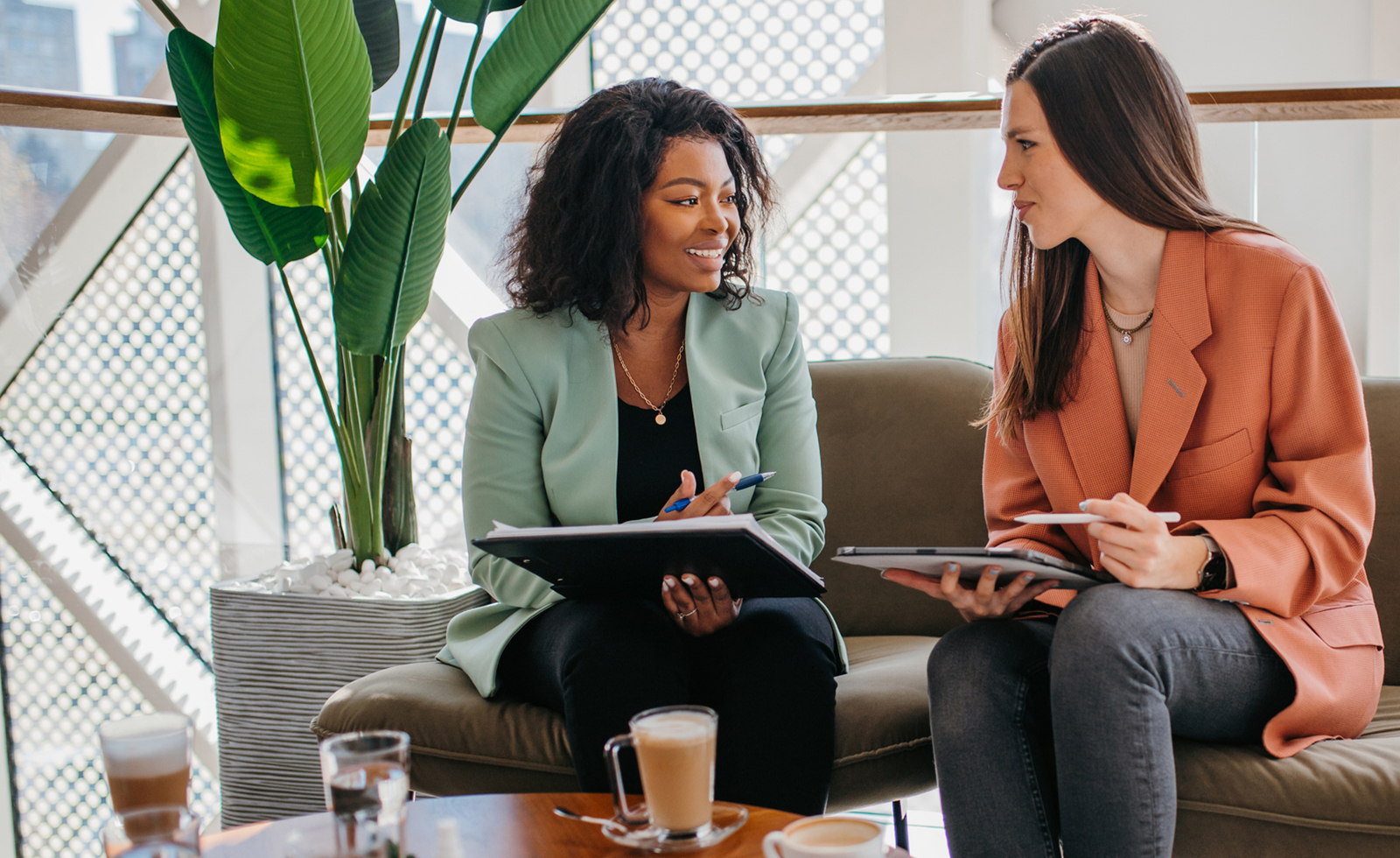 Teamwork of two young business women