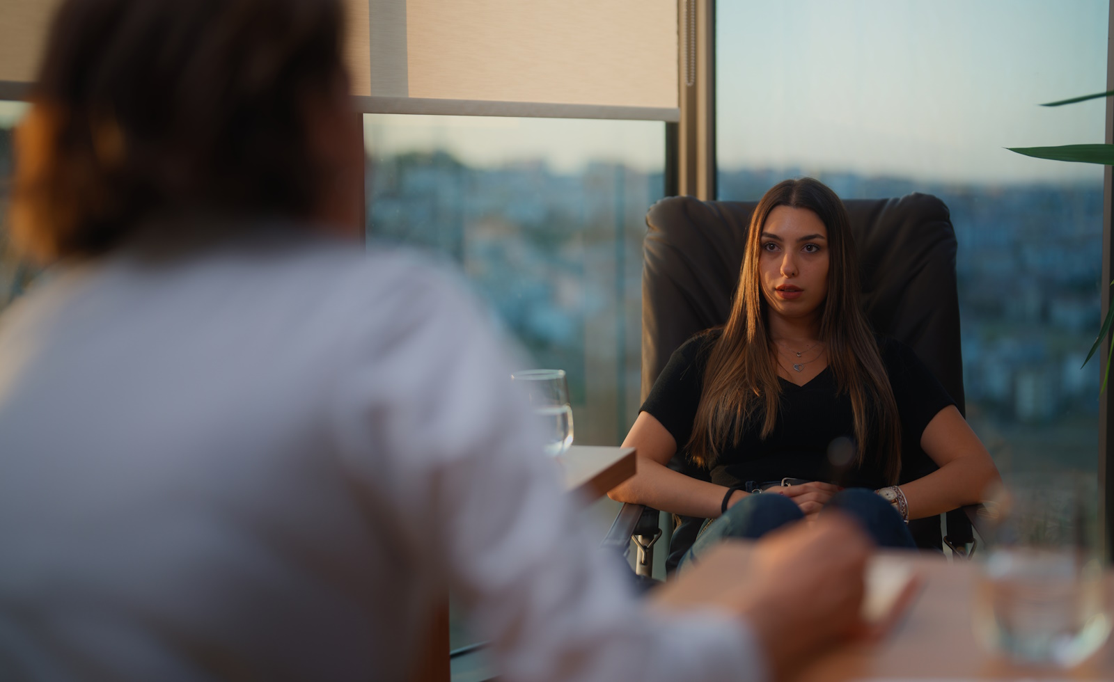Close-up image of a young woman in therapy