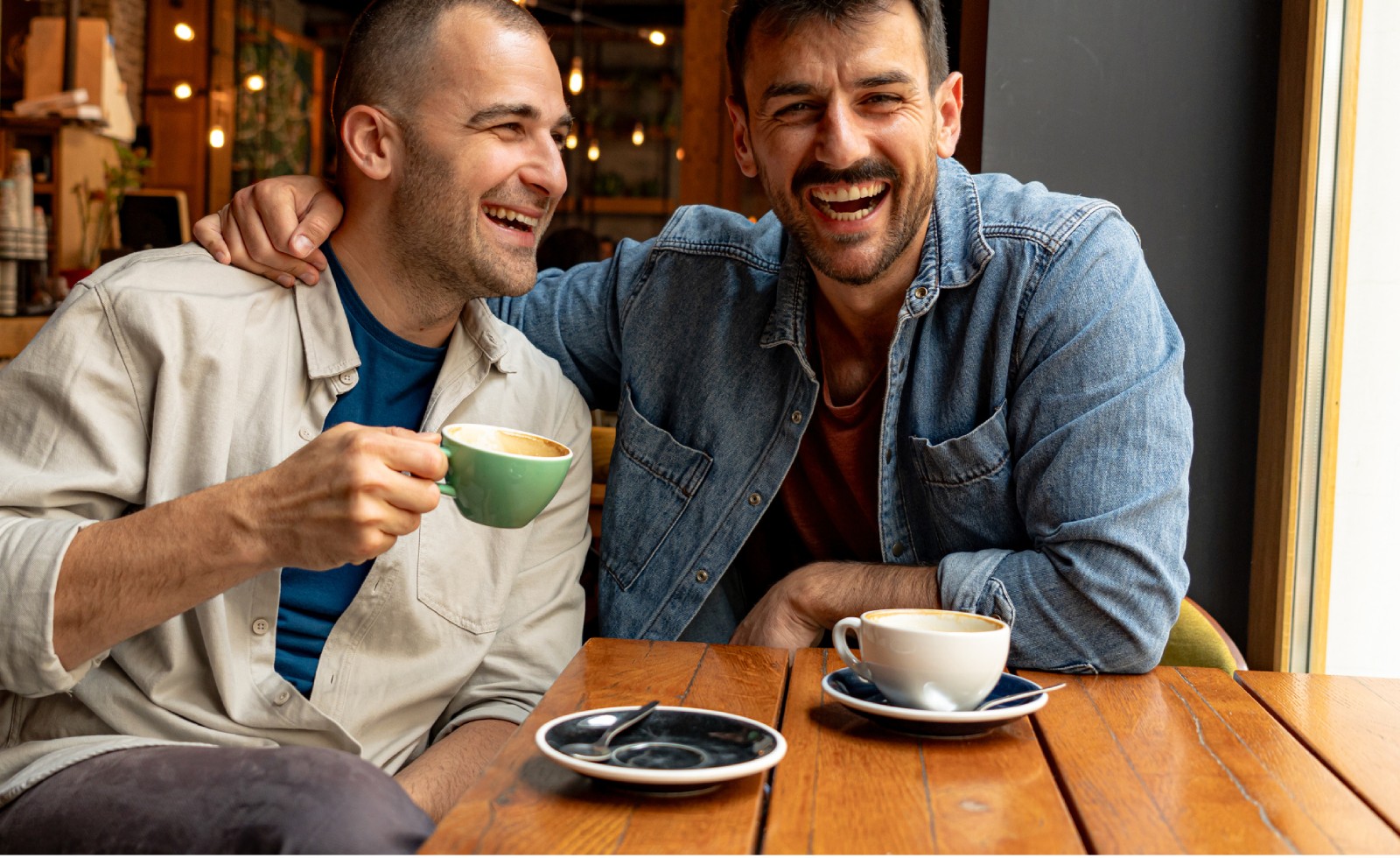 two men enjoying coffee