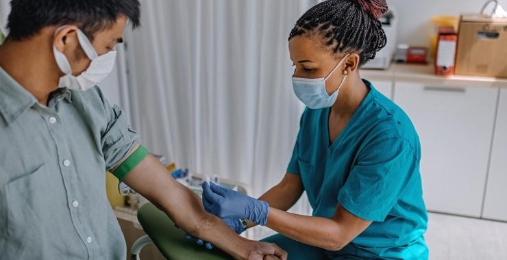 Patient receiving treatment from a doctor
