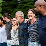 Woman smiling with group of people